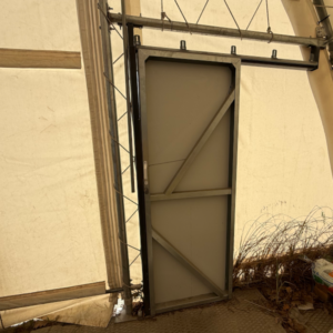 Slankiojančios durys tentiniam angarui